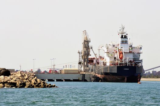quay tanker to discharge its cargo in France with the wearing of Fos-sur-Mer beside Marseilles