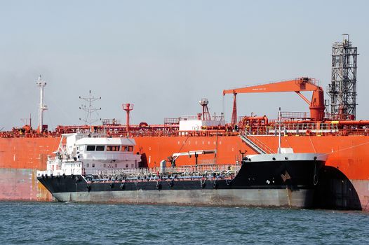 quay tanker to discharge its cargo in France with the wearing of Fos-sur-Mer beside Marseille