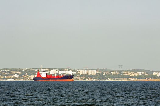 tanker on standby to discharge its cargo in France with the wearing of Fos-sur-Mer beside Marseille.