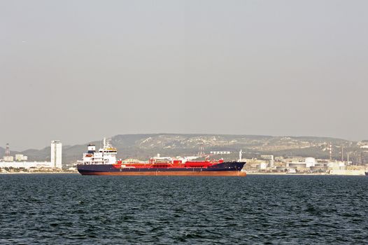 tanker on standby to discharge its cargo in France with the wearing of Fos-sur-Mer beside Marseille.