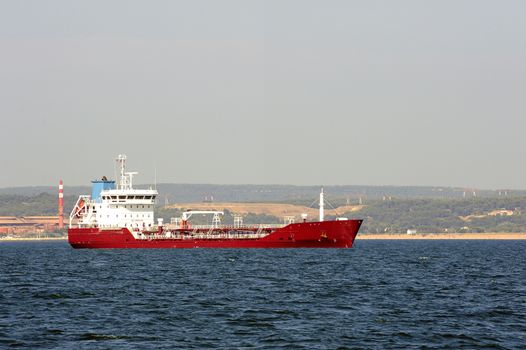 tanker on standby to discharge its cargo in France with the wearing of Fos-sur-Mer beside Marseille.