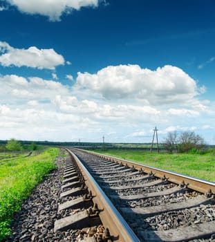 railroad closeup to horizon and blue sky