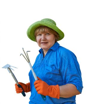 A smiling senior woman holding in hands garden  tools. Image is isolated on white.