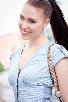 young attraktive happy woman outdoor in summer portrait fashion lifestyle