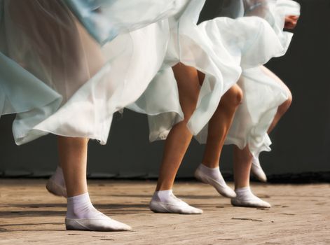 feet dancing women on the stage