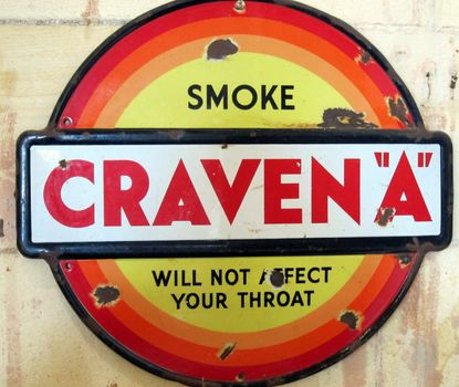 DUNEDIN,NEW ZEALAND-FEB 15TH: Vintage Craven A cigarette sign on February 15th 2012. Craven A's were a favourite cigarette in WW II but have since declined in popularity.