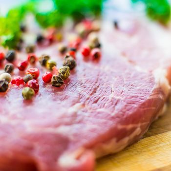 raw meat for steak with pepper