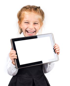 cute laughing schoolgirl with a pc tablet on light background