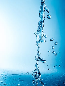 splashes of water on a blue background