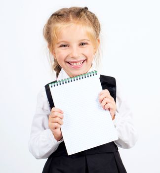 cute schoolgirl with a white sheet of notebook