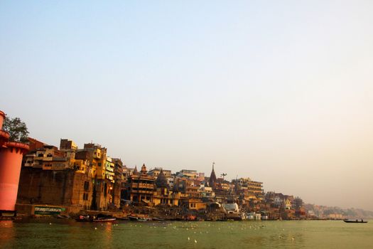 Early morning sunrise panorama of the serene river Ganges near Varanasi, India