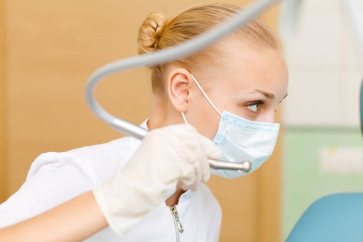 A portrait of a dental worker, dentist or assistant