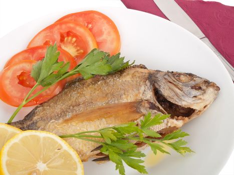 diplodus puntazzo, delicious grilled sheepshead bream, with sliced tomato, lemon and parsley; all in olive oil