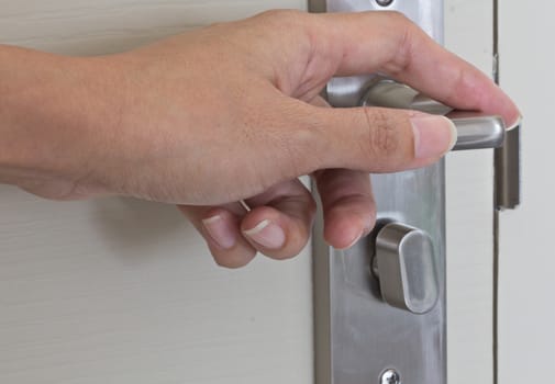 Locking up or unlocking door with hinge in hand