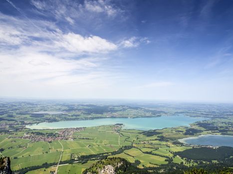 Landscape with lake Forggensee Bavaria and villages, lakes, meadows and forests