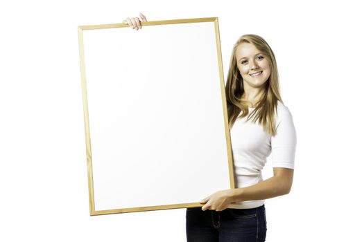 Young, blond woman with blank board, isolated on white background