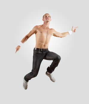 Modern style male dancer jumping and posing. Illustration