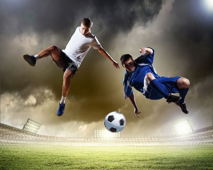 Image of two football players at stadium