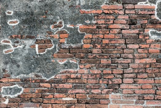 Old vintage red brick wall texture with old concrete wall mix, taken outdoor