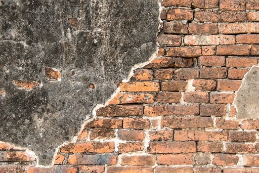 Old vintage red brick wall texture with old concrete wall mix, taken outdoor