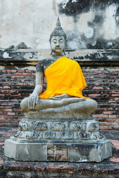 Ancient buddha partly damage, taken outdoor on a sunny day