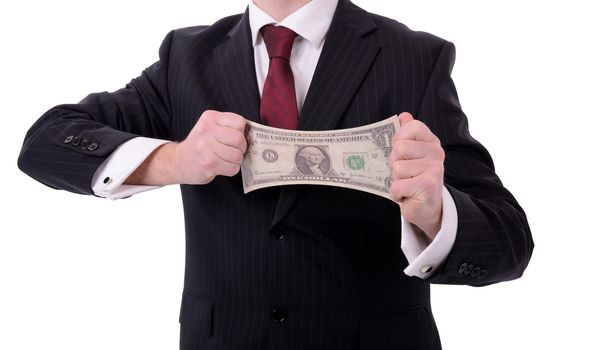 making your money go further, businessman streching out a dollar isolated on white