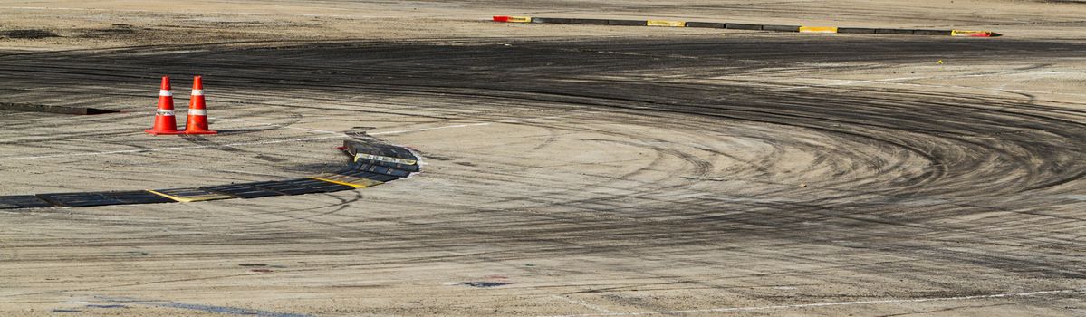 Background with tire marks on road track