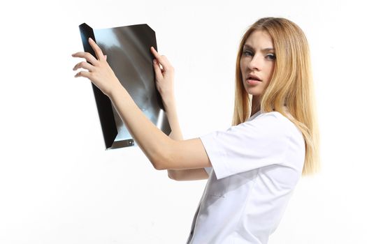 Female doctor examining an x-ray isolated on white background.