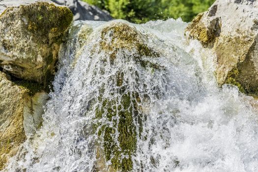 Closeup short-term exposure of a waterfall in Austrian Alps