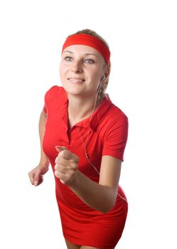 Young beautiful woman in fitness wear runs isolated over background