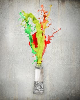 Image of paint tube with color splashes