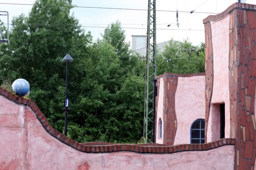 Detail of the German railway station at Uelzen constructed according to plans by the Austrian architect and artist Friedensreich Hundertwasser. Landmark. Public building. Uelzen, 21 June 2013