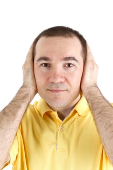 man covers his ears with his hands on a white background