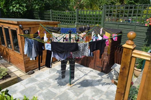 Rotary clothes line in a urban garden.