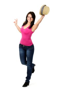 beautiful girl waving a straw hat