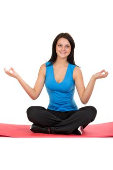 Beautiful girl meditating in the lotus position