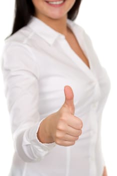 young girl in a white blouse shows OK