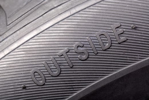 inscription on the new wheel close-up "outside"