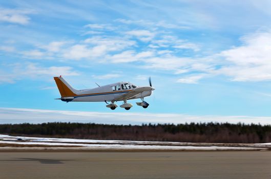 Small Plane Taking Off at a Local Airport