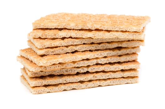 stack of wheat crackers isolated on white background