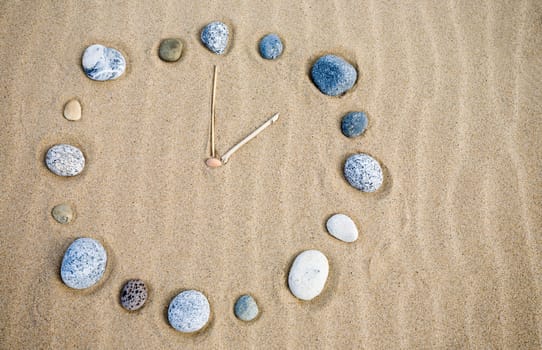 Natural watch on a sand