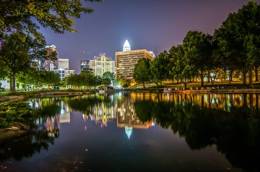 Charlotte City Skyline and architecture at night with reflections