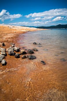 lake jocassee shore on a bright sunny day