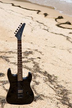 Guitar on a beach