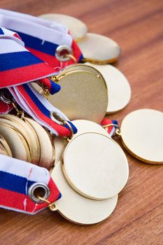 Gold medals before delivery to champions.