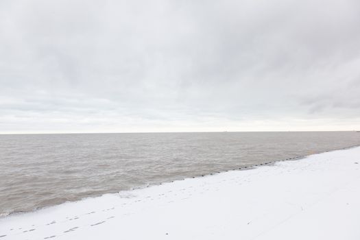 Snow on Christmas day in Chicago near Lake Michigan shore.