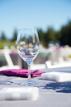 Tables, chairs, decor, and decorations at a wedding reception at an outdoor venue vineyard winery in oregon.