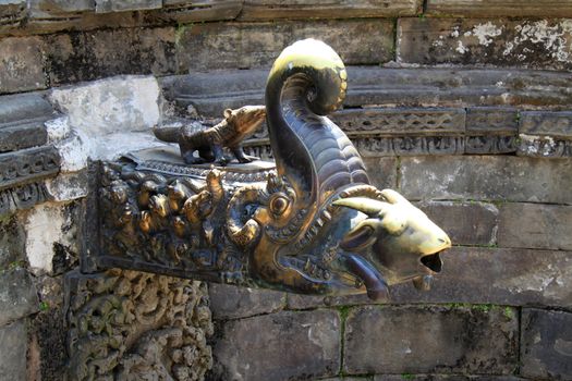 Carving decorations in the water reservoirs in Bhaktapur temple, Nepal 