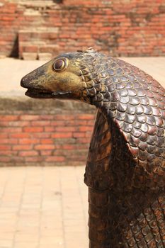 Statue of Bronze cobra in Bhaktapur, Nepal 