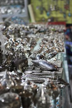 Variuos silver products on sale on a market stall at Chatuchak market